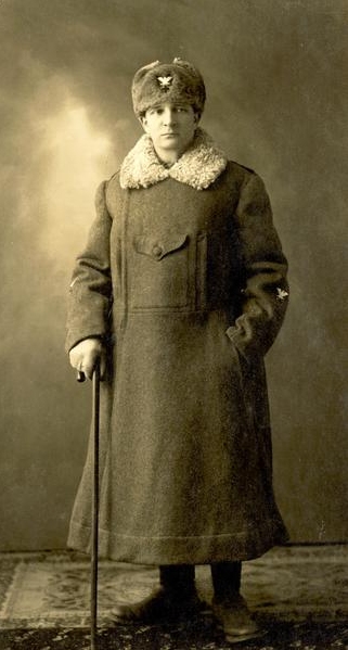 A person in a coat with a cane

AI-generated content may be incorrect.